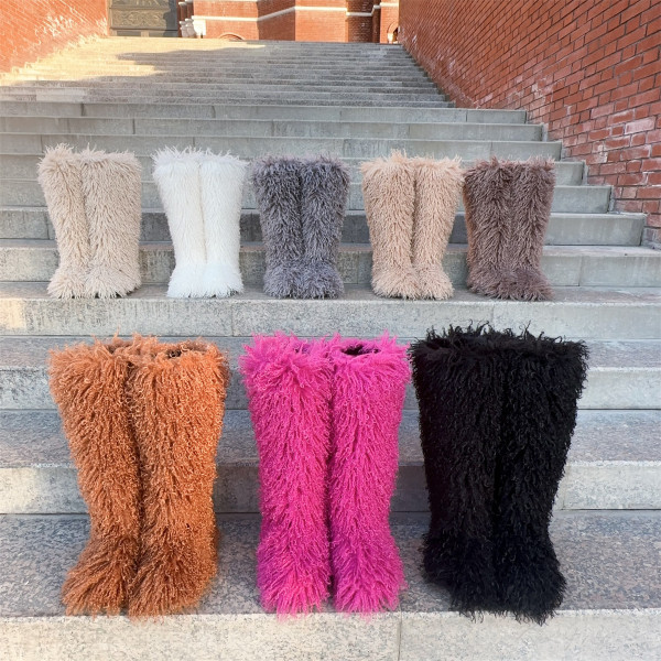 Knee high snow boots with plush boots