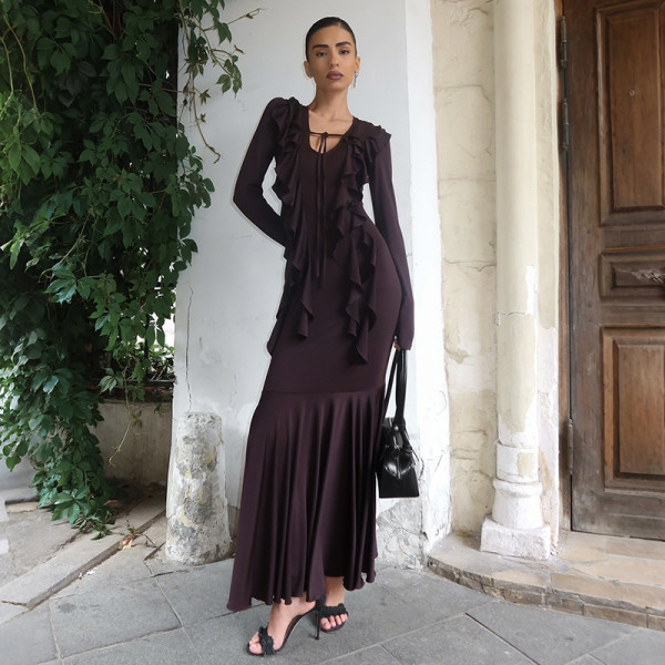 Hip hugging ruffled long sleeved dress