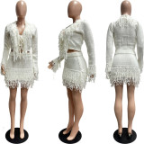 Knitted hand hook tassel strap long sleeved hip hugging skirt set