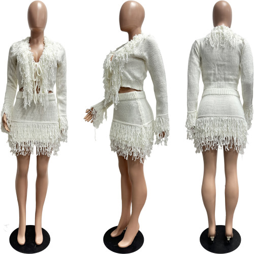 Knitted hand hook tassel strap long sleeved hip hugging skirt set