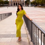 Gold metal buckle slit solid color long skirt round neck short sleeved hip hugging dress