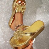 Golden thick soled slippers