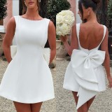Pearl bow waist cinched backless A-line dress