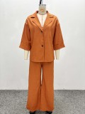 Double-breasted single-button shirt with a loose collar paired with high-waisted straight-leg pants (two-piece set)