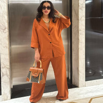 Double-breasted single-button shirt with a loose collar paired with high-waisted straight-leg pants (two-piece set)