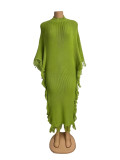 Knitted tassel dress with high neck, bat sleeves, and split hips