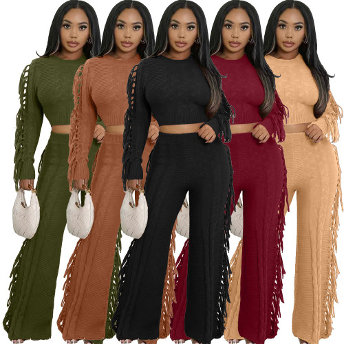 Solid color knitted long sleeved tassel set