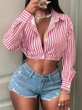 Vertical striped long sleeved button up shirt
