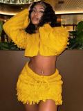 Open navel long sleeved cardigan with tassel skirt two-piece set