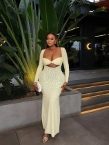 Long sleeved chest hugging tight fitting one-piece dress