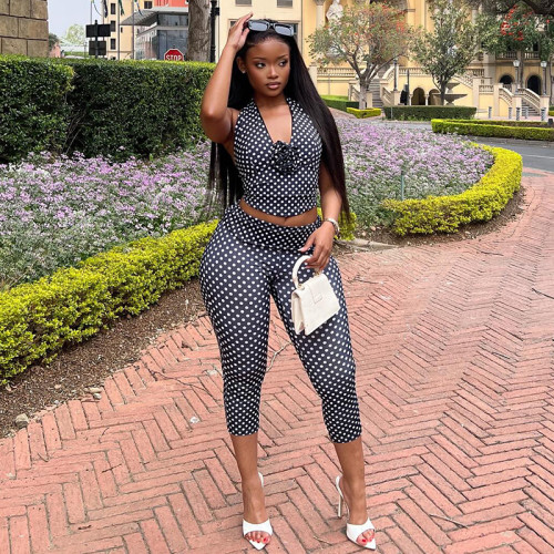 Two piece set of polka dot printed neck hanging top, small foot tight pants