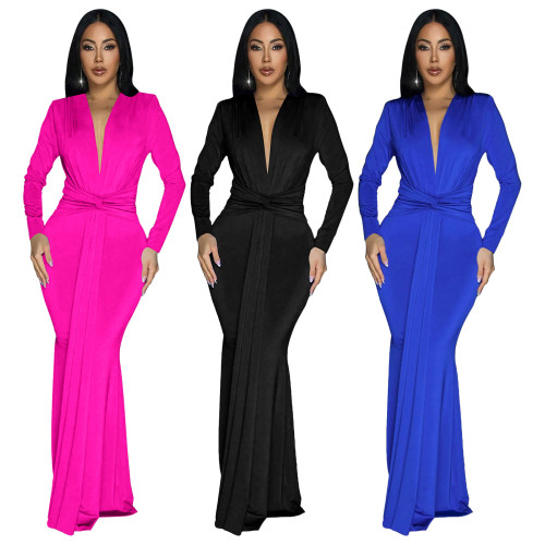 Long sleeved waist cinched pleated dress