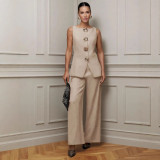 Two piece set of gold button vest pants