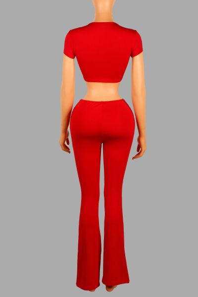 Low cut V-neck short sleeved T-shirt top with hardware waist and hips, long pants set