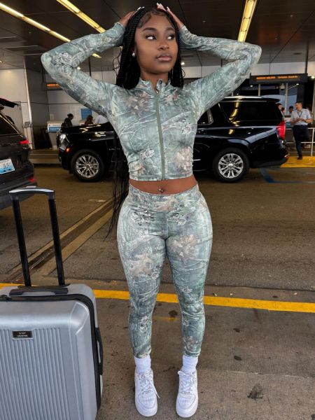 Printed long sleeved zipper cardigan and pants two-piece set with exposed navel
