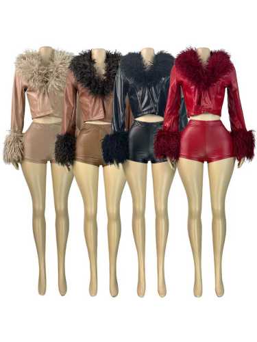 Elastic leather hip hugging shorts