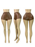 Elastic leather hip hugging shorts