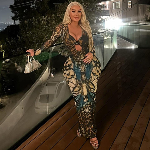 Loop buckle hip hugging low neck long sleeved dress with a back slit