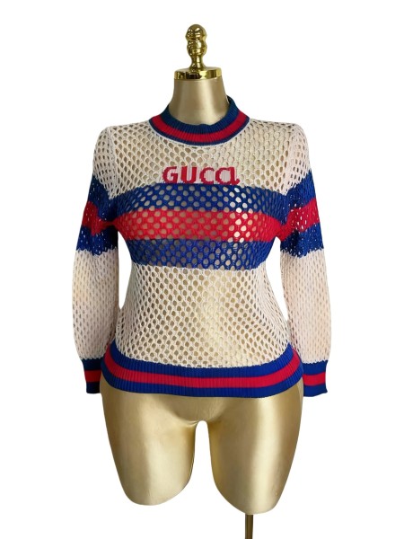 Hollow out color blocked letter jacquard long sleeved knitted sweater top