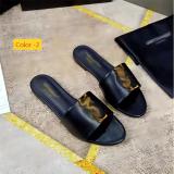 Flat bottomed oversized sandals worn on top of one word slippers