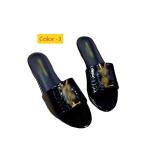 Flat bottomed oversized sandals worn on top of one word slippers