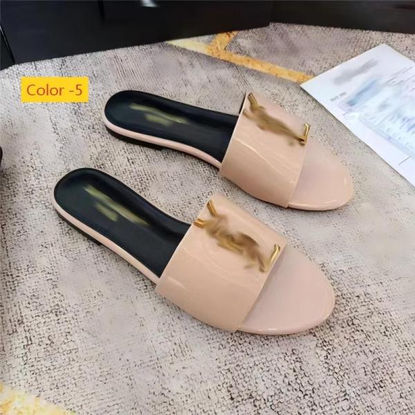Flat bottomed oversized sandals worn on top of one word slippers