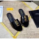 Flat bottomed oversized sandals worn on top of one word slippers