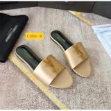 Flat bottomed oversized sandals worn on top of one word slippers