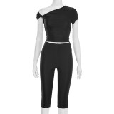 Diagonal cross twisted off shoulder pullover top with high waist and hip hugging cropped pants set