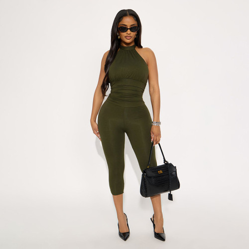 Hanging neck strap backless solid color pleated waist cinching seven part jumpsuit