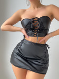 Lacquered strapless strap revealing lingerie