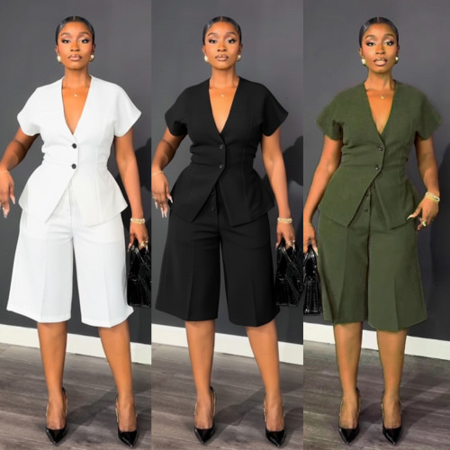 Two piece set with shoulder sleeves, waist cinching straps, and mid length pants