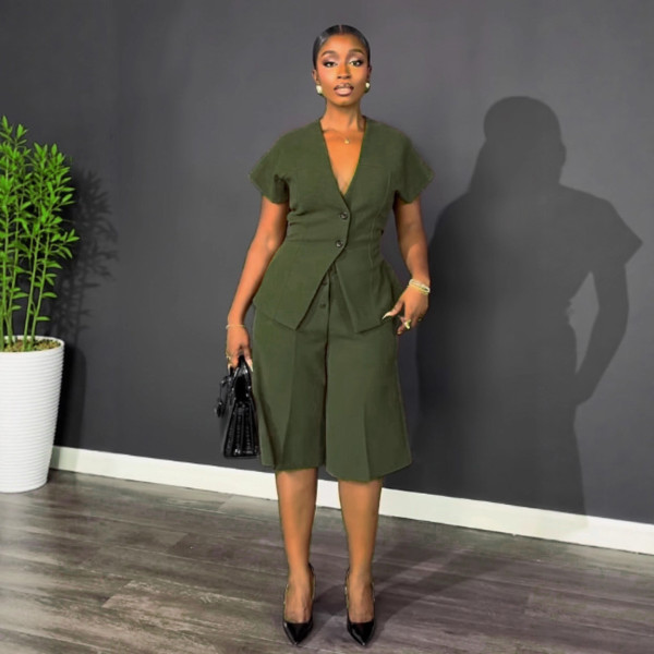 Two piece set with shoulder sleeves, waist cinching straps, and mid length pants