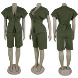 Two piece set with shoulder sleeves, waist cinching straps, and mid length pants