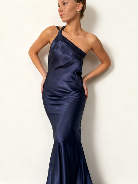 Sleeveless diagonal collar dress with exposed back and hollowed out waist cinching long skirt