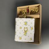 Ladies' handbag with hanging accessories
