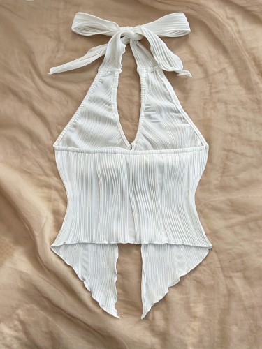 Tie up metal buckle, asymmetrical hem vest with a snug fit