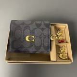 Ladies' handbag with hanging accessories