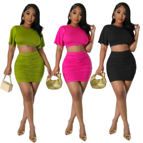 Top paired with hip hugging skirt two-piece set