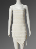 White strapless pleated dress with hip side straps and short skirt