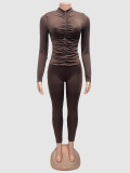 Two piece set of pleated round neck long sleeved top