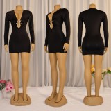 Deep V metal accessory long sleeved hip hugging dress