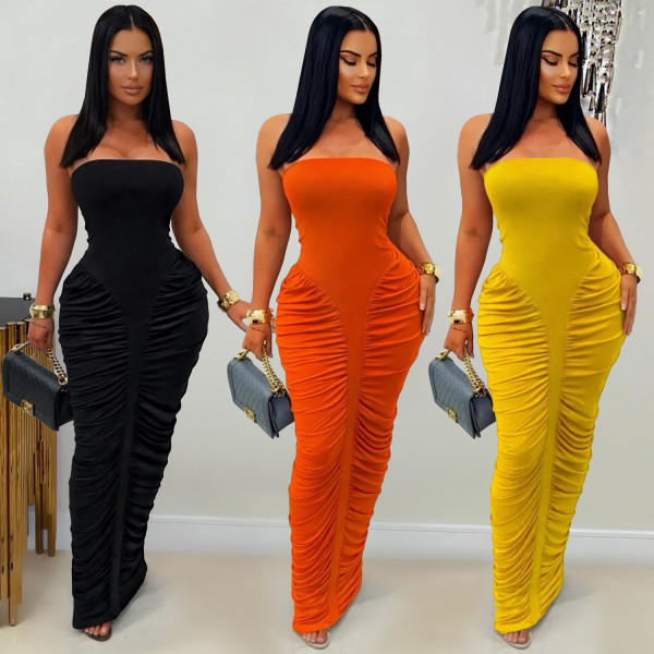 Strapless solid color hip hugging pleated dress