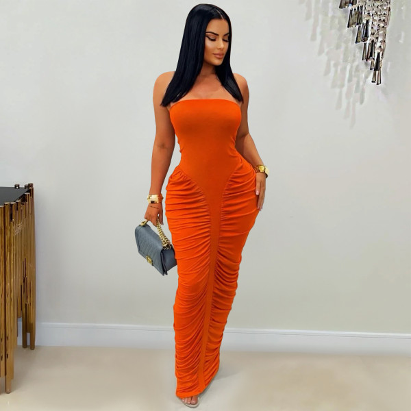 Strapless solid color hip hugging pleated dress