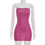 Polka print strapless tight fitting hip hugging dress