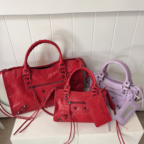 Large rivet hand-held pillow bag, single shoulder crossbody bag