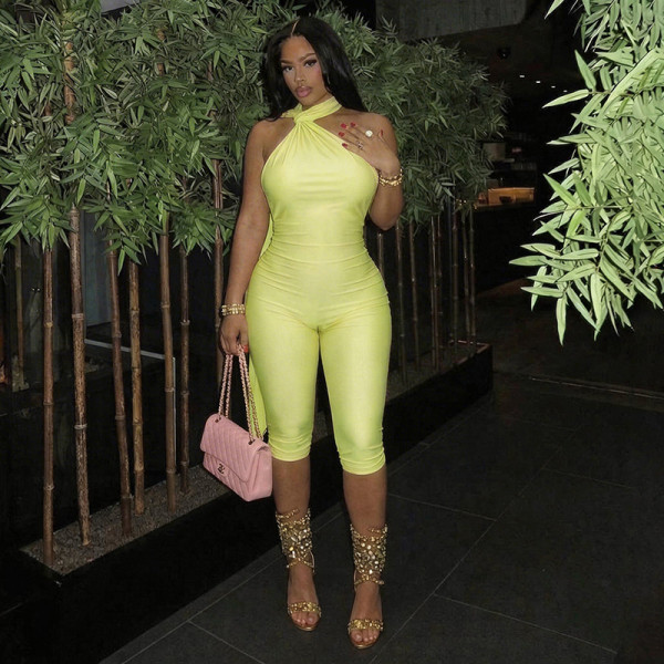 Twisted neck hanging ribbon V-shaped pleated waist revealing circular splicing jumpsuit