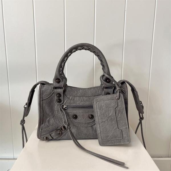 Small rivet hand-held pillow bag, single shoulder crossbody bag