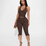 Deep V-neck halter top with pleats and tie up cropped pants two-piece set