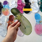 Transparent jelly flip flops with herringbone design